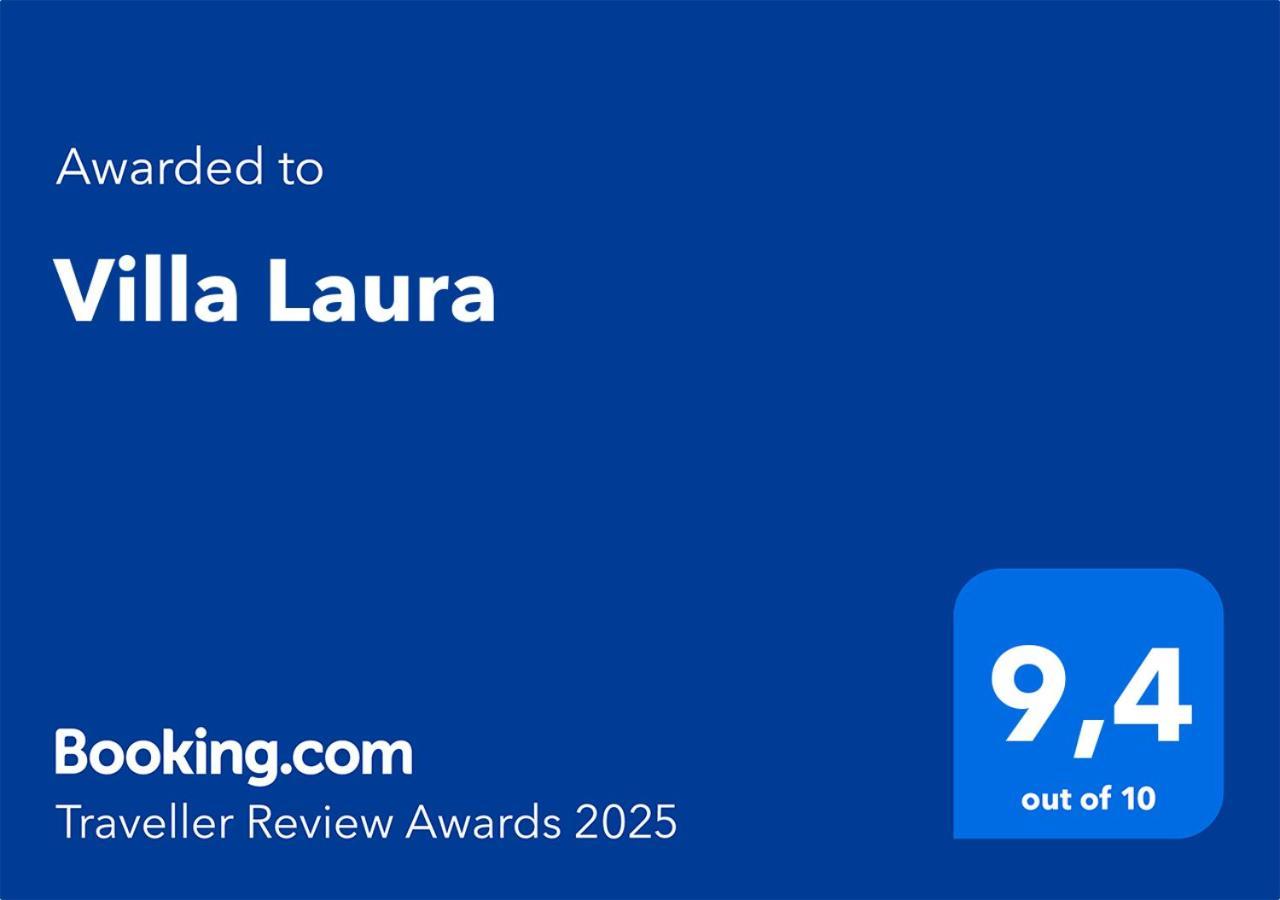 Laura *